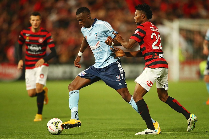 Bernie Ibini takes on the Western Sydney Wanderers defence