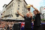 Henry and McCaw hold up the World Cup