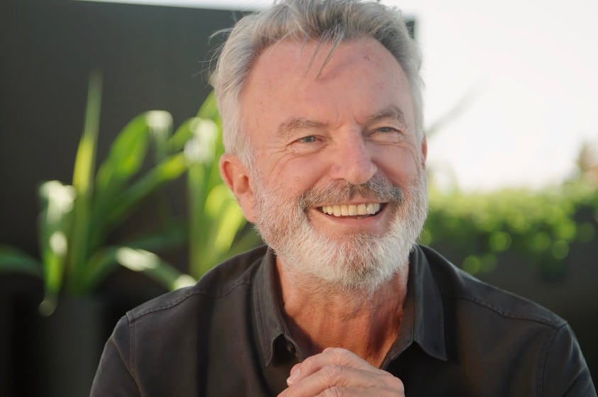 Sam Neill smiling