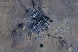 A satellite image of a facility in the desert 