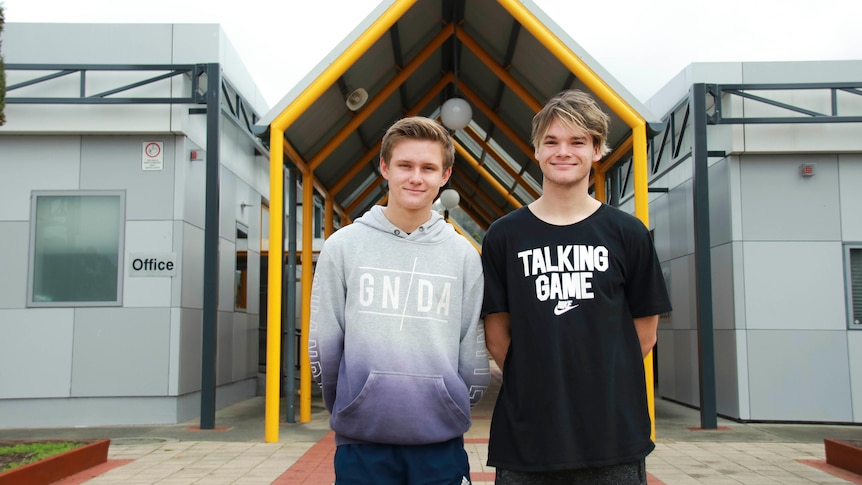 Lachlan Blackwell and Quaide Barrett, students of Cosgrove High School, stand together