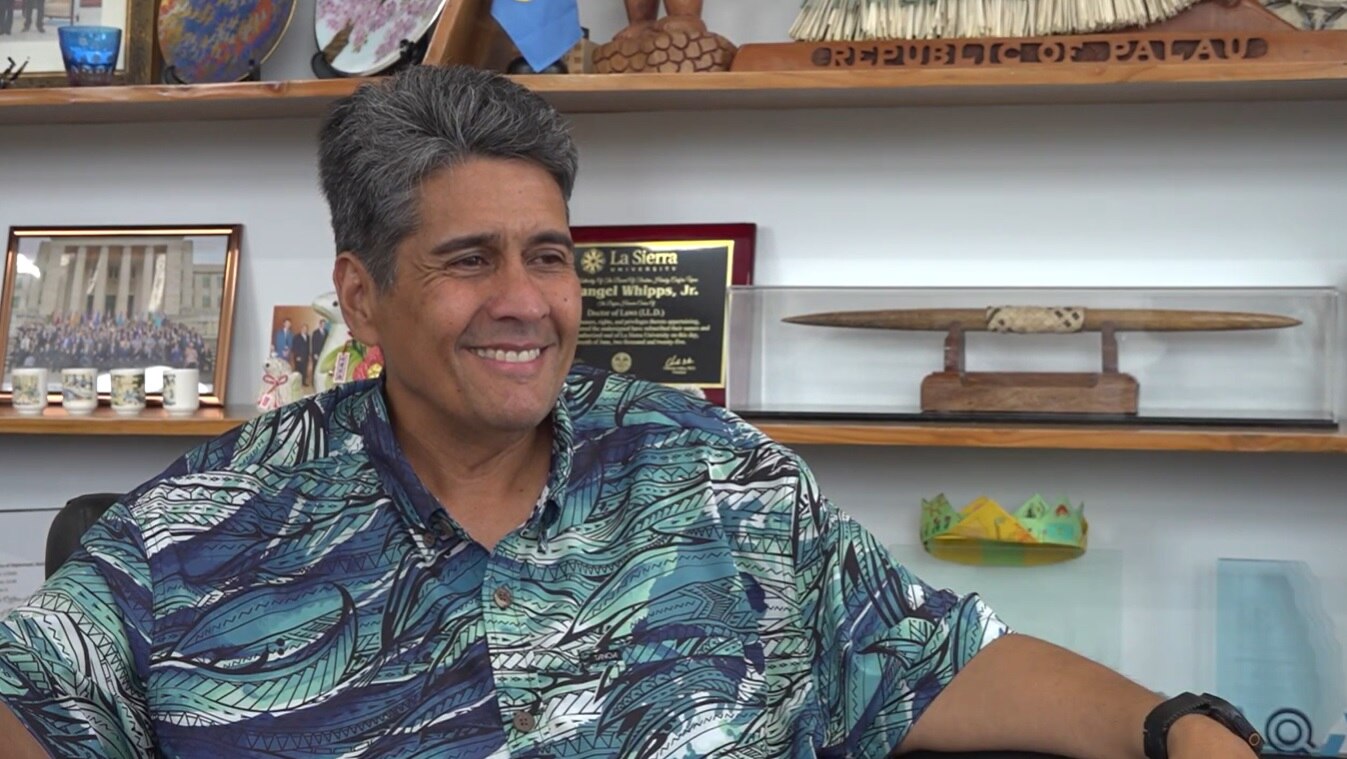 President Whipps sits in his office, looking relaxed.