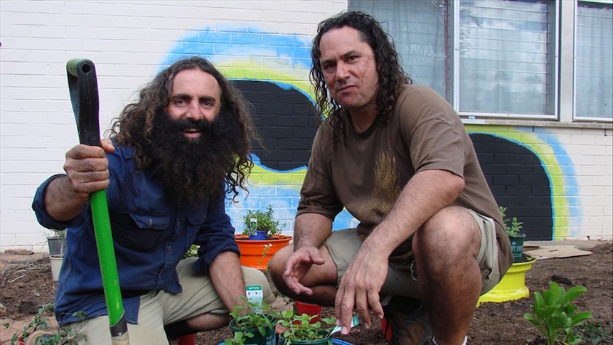 Gardening Australia host Costa Georgiadis and presenter Clarence Slockee in the new sensory garden.
