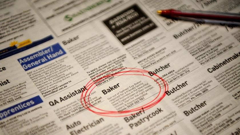 Jobs circled in a newspaper employment section