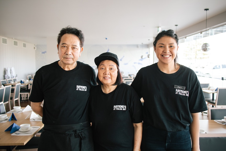 Raymond and Susie Ng with daughter Emily in their new restaurant, Raymond's at Malua Bay. 