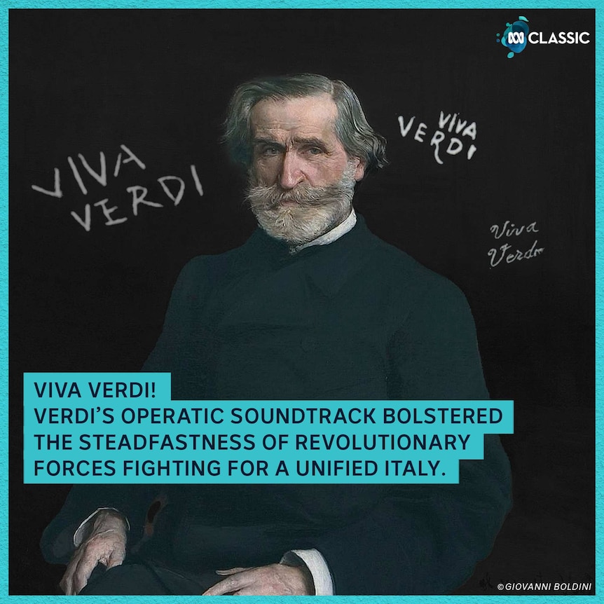 An older Giuseppe Verdi is dressed in sombre black clothes, in front of a background reading 'Viva Verdi.'