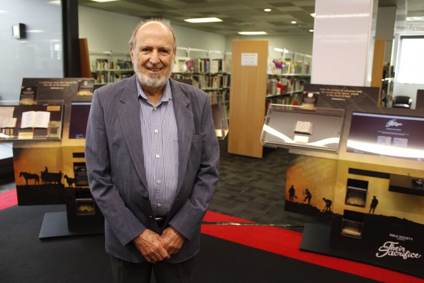 Dr John Harris, curator of the Bible exhibition in Launceston