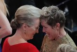 Meryl Streep congratulates Frances McDormand on her Oscar win