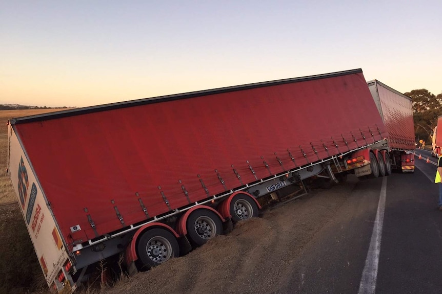 Truck slides down an embankment on Sturt Highway, 80km north east of Adelaide