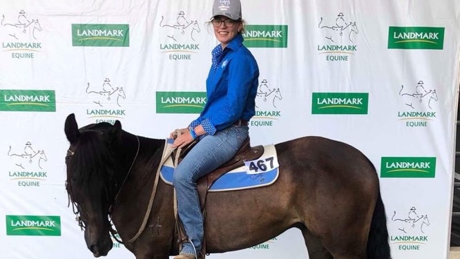 Meg Everett in a Dolly's Dream shirt sitting on a horse she was gifted at Tamworth's Landmark classic horse sale.