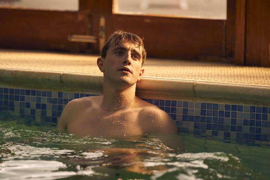 A scene from Normal People with a young man Connell in a swimming pool