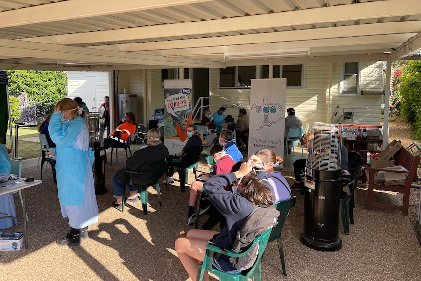 People sitting down waiting to be vaccinated at Goondiwindi