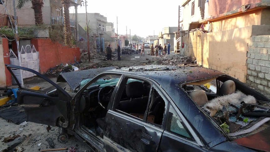 The site of a suicide bombing in the northern Iraqi city of Kirkuk