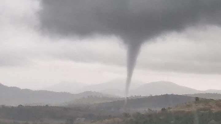 Two tornadoes seen as severe storm warnings issued for Queensland