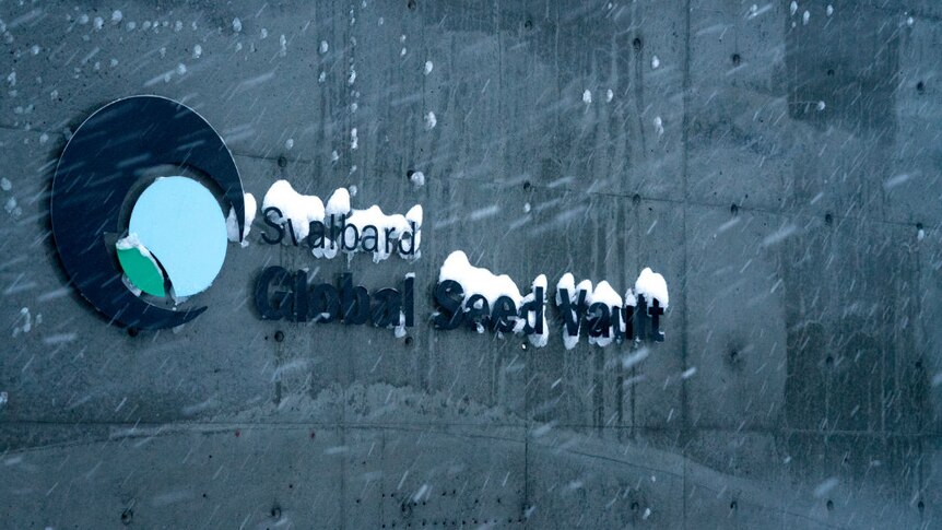 A sign on the outside of the Global Seed Vault in Norway.