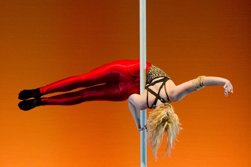 Circus performer on pole at Brisbane audition in October 2013