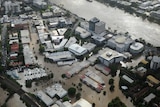 Homes and businesses hit by floodwaters in Brisbane in 2011
