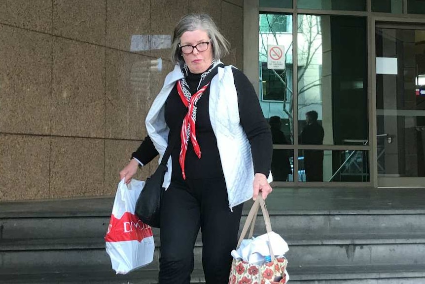 Rosemary Davies leaves the Melbourne Magistrates' Court.