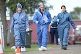 NSW Police forensic officers at the scene of a home invasion on Elizabeth Drive in Badgerys Creek.
