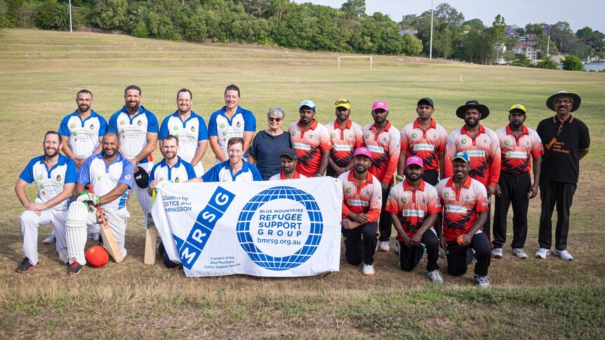 Another team stand next to the Ocean 12 team after a game at Gladesville.