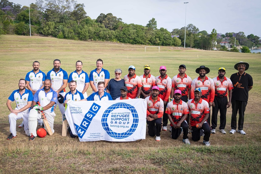 Another team stand next to the Ocean 12 team after a game at Gladesville.