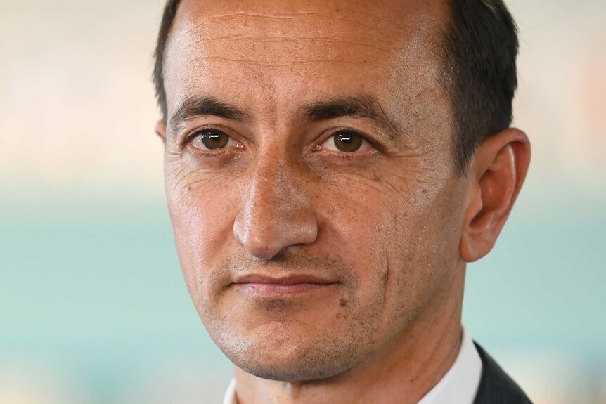 Liberal candidate for Wentworth Dave Sharma looks on during a doorstop.