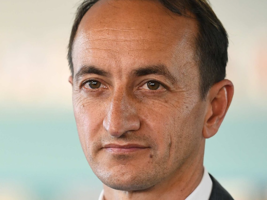 Liberal candidate for Wentworth Dave Sharma looks on during a doorstop.