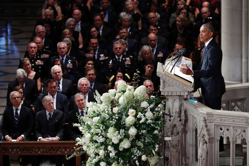 Barack Obama speaks at a memorial service.