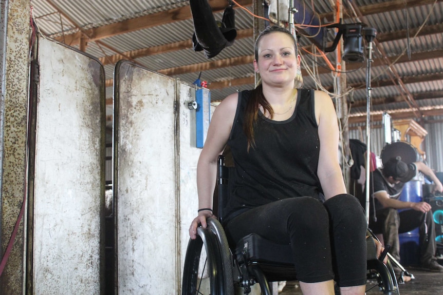 Nikki Towell in the shearing shed in her wheelchair.