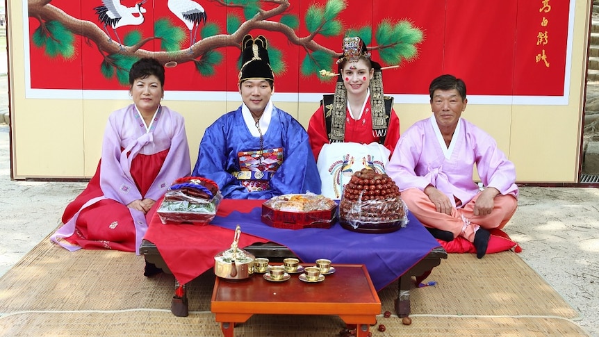 Hugh, Nichola and Hugh's parents at their Korean wedding