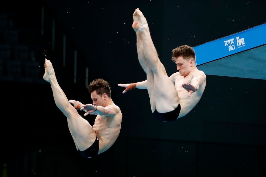 Tom Daley and Matty Lee dive off a 10m platform at Tokyo Olympics.
