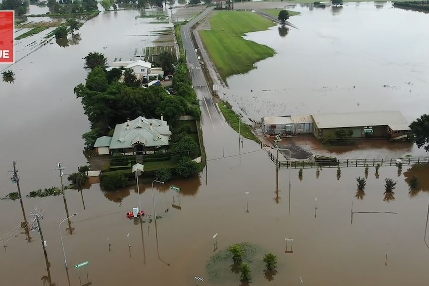 a house covered by floodwater