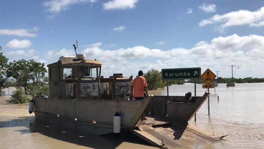 A barge amid flooded water near Karumba.