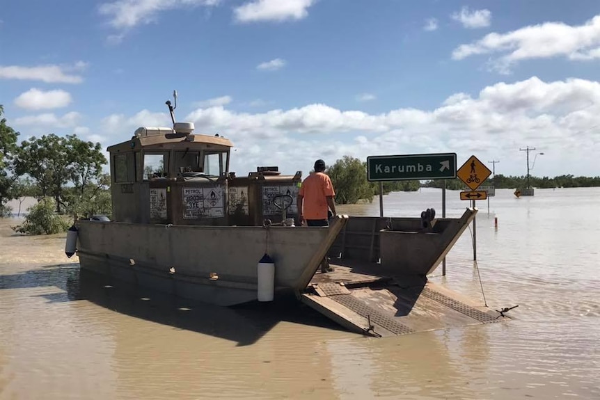 A barge amid flooded water near Karumba.