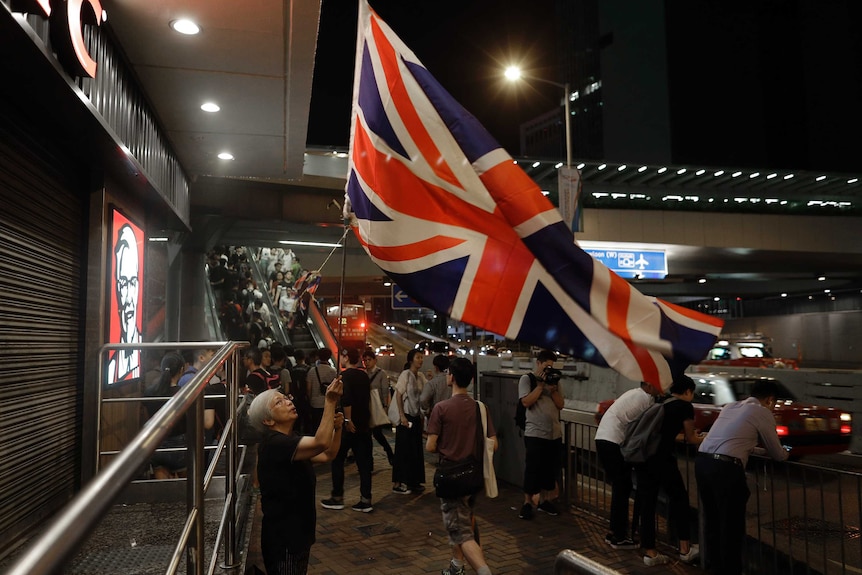 Hong Kong protester waves British flag