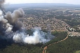Firefighters battled bushfires in western Sydney yesterday