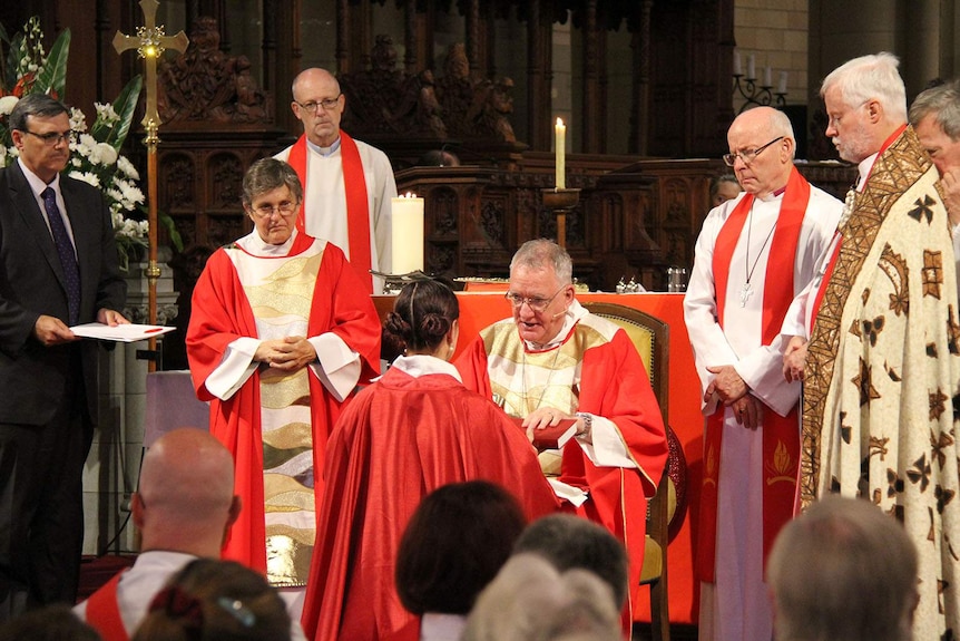 Anglican Archbishop of Brisbane Phillip Aspinall anoints Reverend Rosemary Gardiner