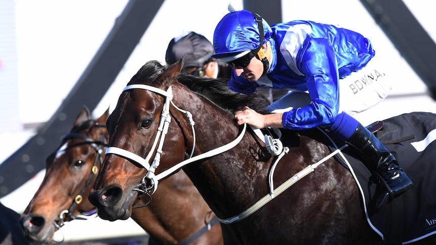 Hugh Bowman riding Winx at the finish of the Warwick Stakes.