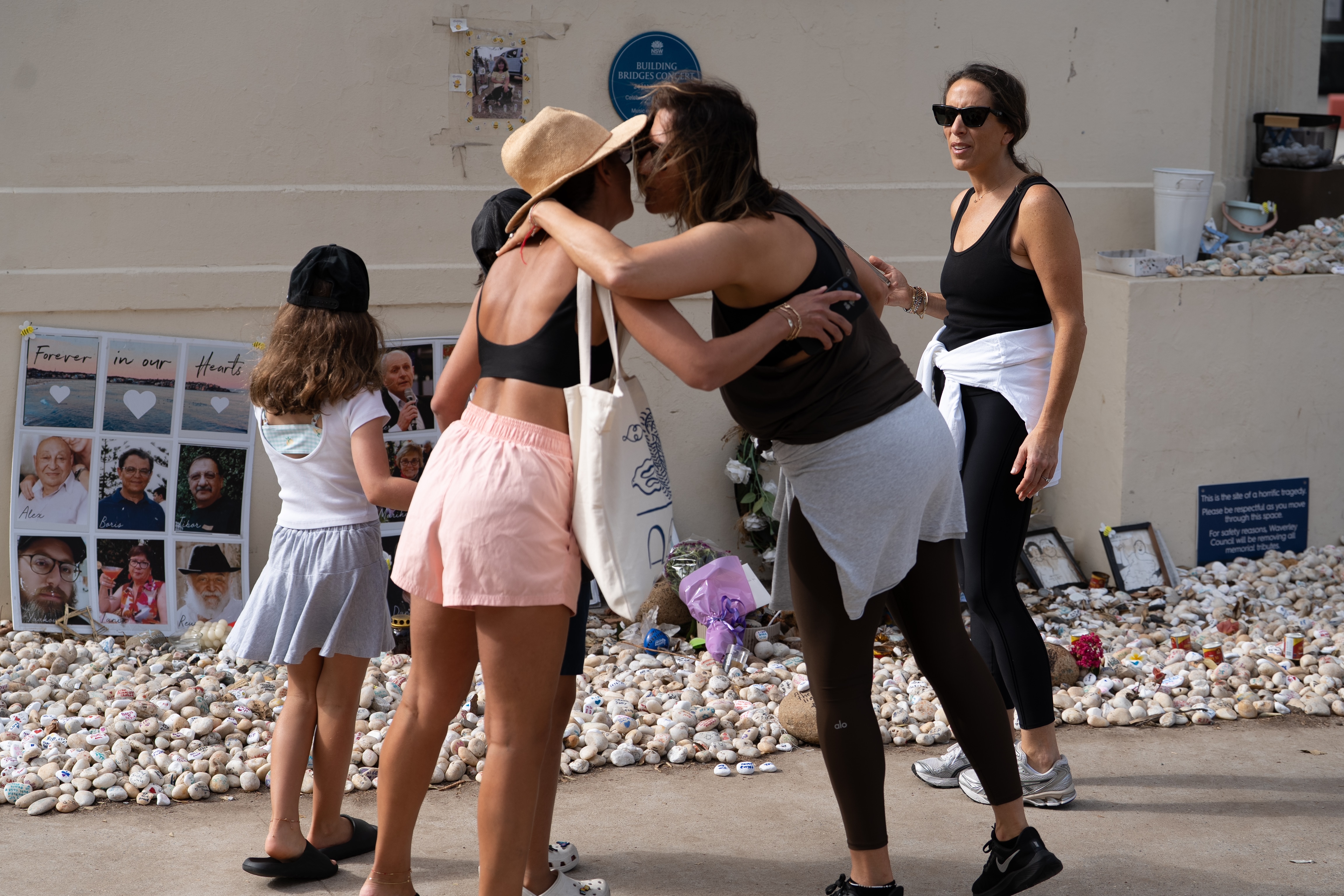 Sombre scenes as Australians mark day of mourning for Bondi attack victims