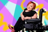 Stella Young side-on for a story about having pride in loving her life