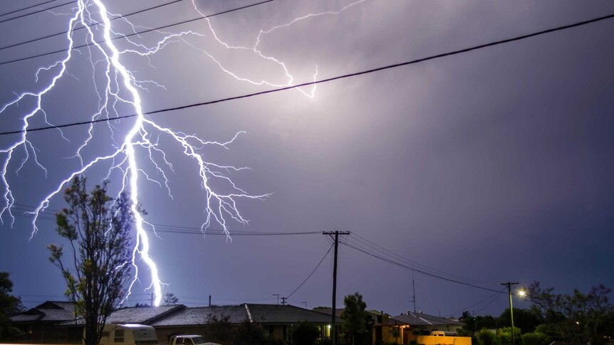 A bolt of lightning touches down during a night timw storm over Casino in northern New South Wales.