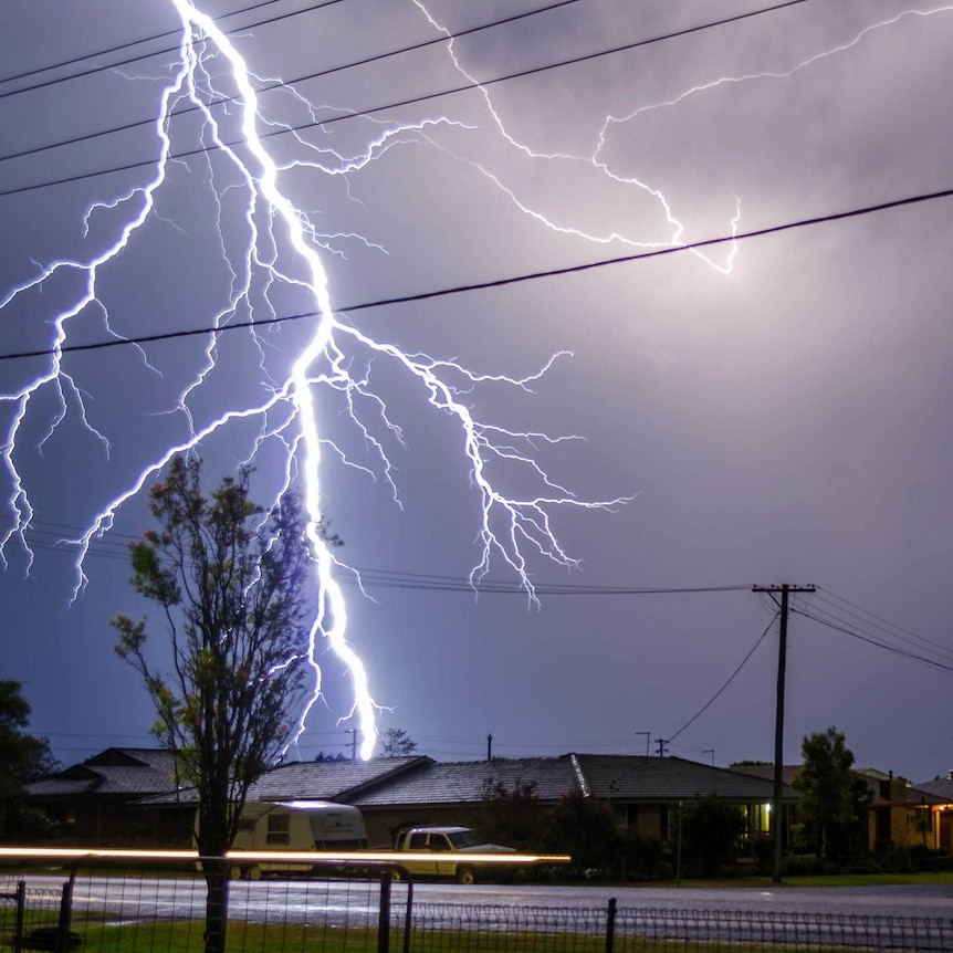 A bolt of lightning touches down during a night timw storm over Casino in northern New South Wales.