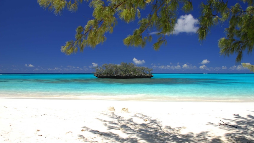 Turquoise blue water and white sandy beaches.