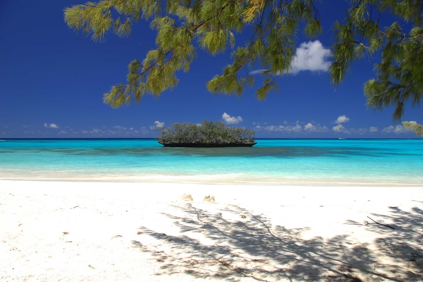 Turquoise blue water and white sandy beaches.