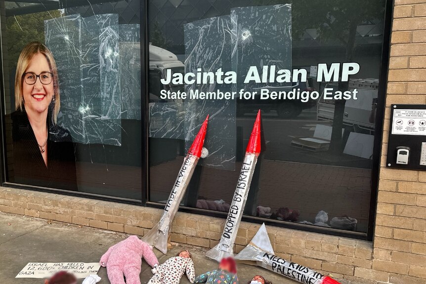 Jacinta Allan's office window cracked and smashed with rockets and bloodied baby dolls laid in front of it.