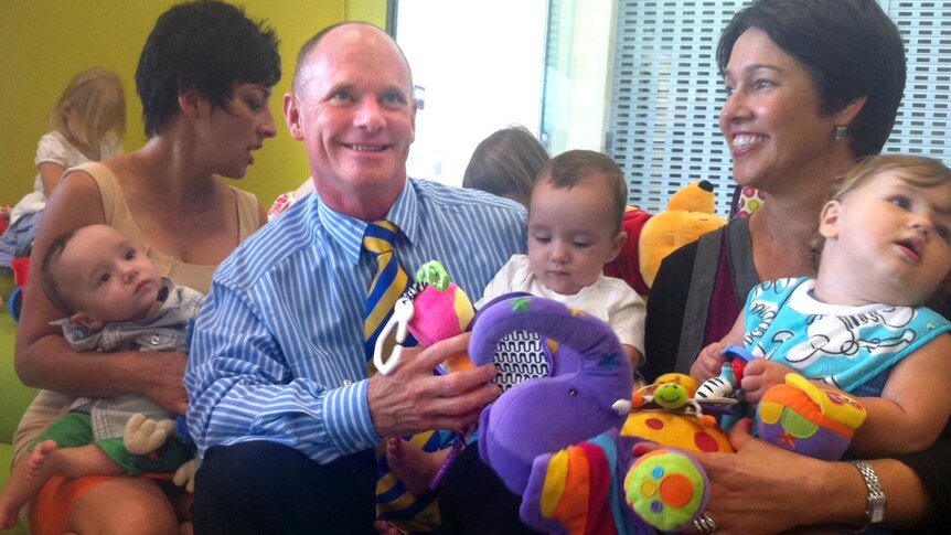 Campbell Newman with children while campaigning in Caboolture.