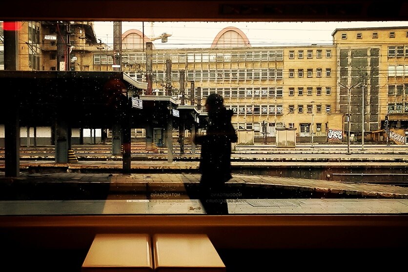 Belgian photographer Michel Petillo submitted a photo of silhouetted man walking along a train platform.