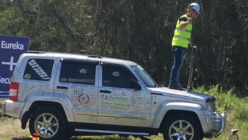 Ashton Wood preparing to destroy his "lemon" Jeep last year.