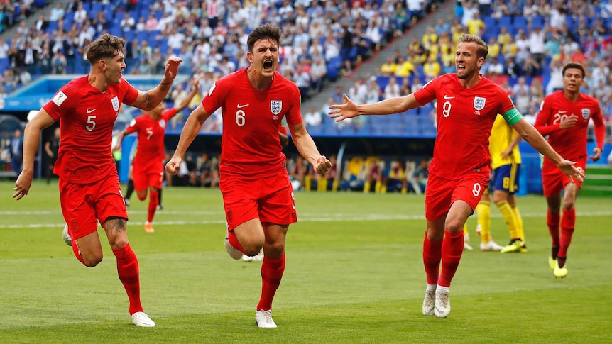 Harry Maguire celebrates goal for England against Sweden