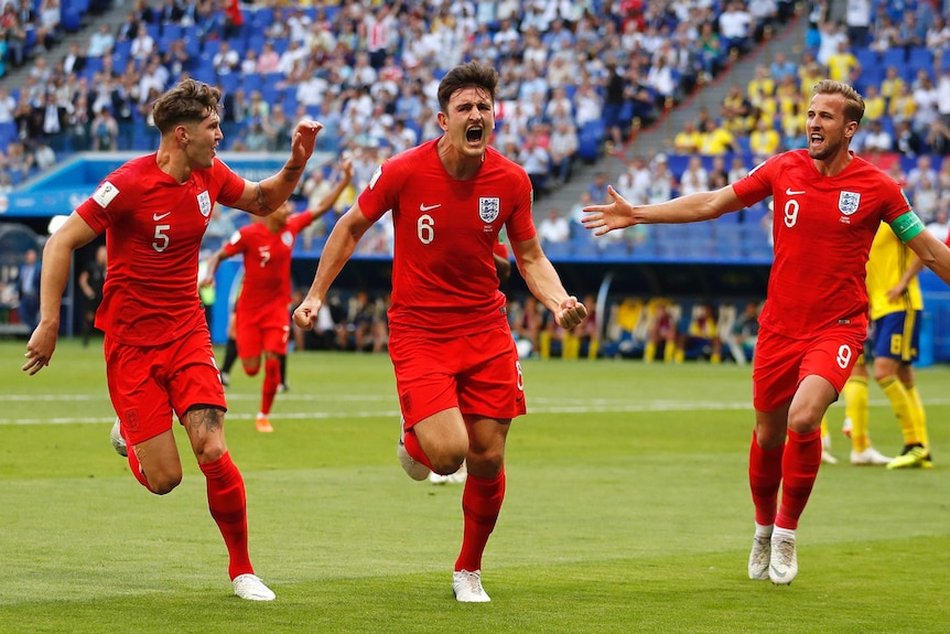 Harry Maguire celebrates goal for England against Sweden